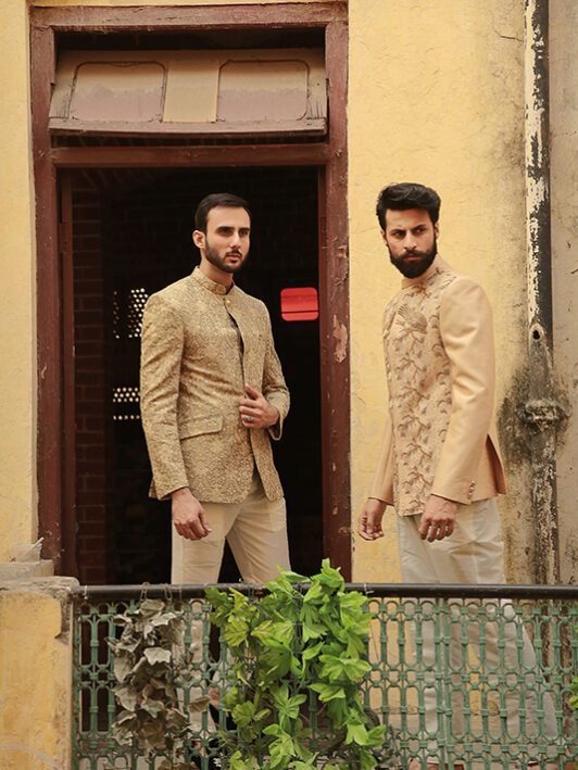 Versatile embroidered jamawar prince coat on an exquisite red base Elevate your look with this refined and standout ensemble Crafted with meticulous attention to detail and contrasting embroidery Ideal for weddings, receptions, and upscale gatherings Perfect choice for those seeking a blend of elegance and style Make a statement with the intricate embroidery and red base Shop online for this finely crafted and standout prince coat